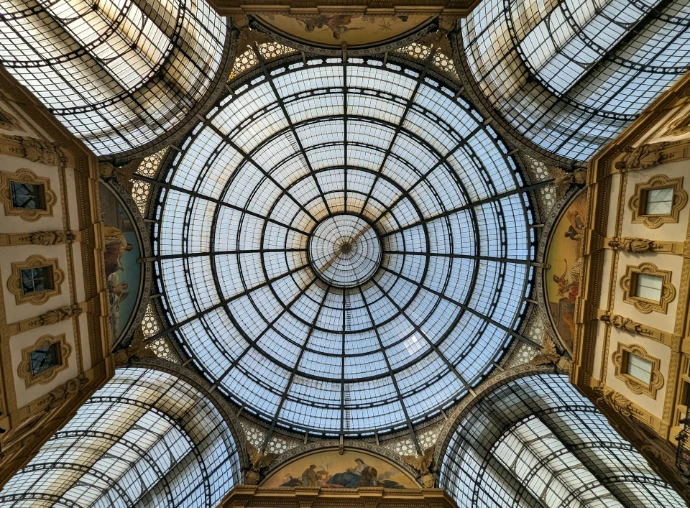 the ceiling of a building with a glass dome
